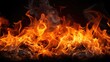 © Fotograf - A close-up shot of a fire on a black background. Perfect for adding a warm and dynamic element to any design or project