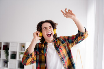 Poster - Photo of positive good mood guy wear plaid shirt singing having fun enjoying songs earphones indoors room home house