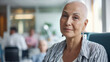 Balding woman with cancer in clinic, cancer patients, recovering from illness. 