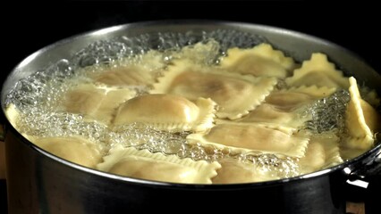 Canvas Print - Ravioli pasta in boiling water. Filmed on a high-speed camera at 1000 fps. High quality FullHD footage