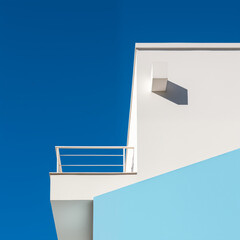 Wall Mural - Minimal building for abstract background., Colorful minimal building with blue sky, clear sky, nature light.