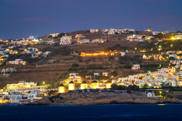 Wall Mural - Mykonos village illuminated at dusk on Mykonos island. Greece