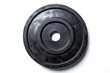 © VolumeThings - Top view of a black iron weight plate alone on white background