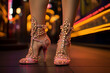 legs of a woman showgirl with sparkly high heels in las vegas