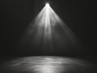 Spotlight shining down from above onto a stage