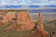  Independence Monument And The Book Cliffs In Colorado National Monument On A Sunny Spring Day  Near Fruita, Colorado    