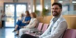 Confident healthcare professional smiling in clinic waiting area with patients. contemporary medical office setting. stock image for healthcare industry. AI