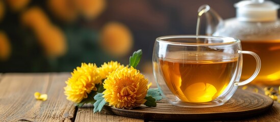 Sticker - Thai style chrysanthemum tea on wooden table.