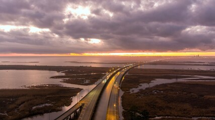 Wall Mural - Foggy evening over Jubilee Parkway on Mobile Bay