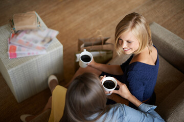 Poster - Friends, women and drinking coffee from above to relax on the sofa at home. Female people, smiling and bonding with care to rest with tea drinks and conversation after retail shopping