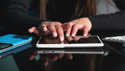 Wall Mural - Caucasian young woman using tablet.