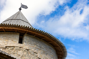 Wall Mural - Stone tower of an old fortress. Kremlin of Pskov, Russia