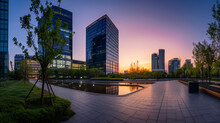 A Panoramic View Of A High-rise Corporate Office Building At Dusk.