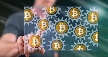 Canvas Print - Man touching a bitcoin concept