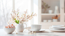 Photo of a light white kitchen, dishes with Easter eggs on the table, morning. Flowers in a vase, white dishes and fresh eggs, a healthy breakfast