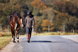 Girl rider goes riding with her horse ready to ride.