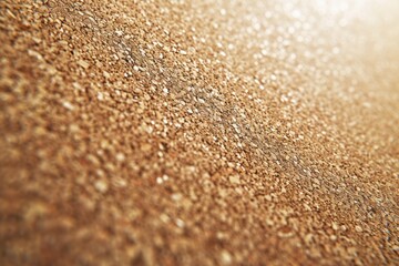 Poster - A detailed view of the texture and patterns on a sand surface, with a blurred background. Suitable for various design projects and nature-themed concepts