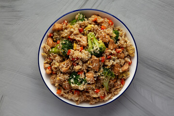 Wall Mural - Homemade Chicken Teriyaki Fried Rice on a Plate, top view. Flat lay, overhead, from above.