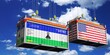 © PX Media - Shipping containers with flags of Lesotho and USA - 3D illustration
