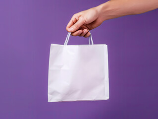 Wall Mural - Hand Holding Blank White Tote Bag Against Purple Background - Generative AI