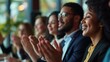 © Andrey - people in business attire applaud, clapping in a meeting