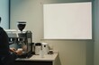 office break area with a blank banner on the wall and person making coffee