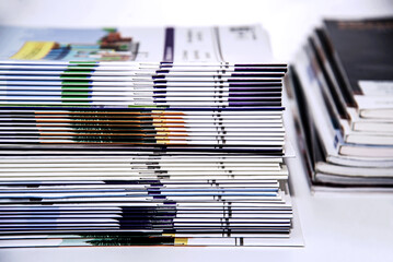 Wall Mural - stack of magazines on white background isolated