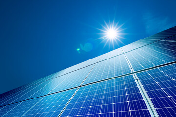 Wall Mural - solar panels reflect sparkling light from the sun ,blue sky, clean energy and the environment