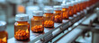 Medicine tablets are bottled on a conveyor belt of a pharmaceutical factory production line.
