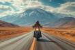 A male biker rides a motorcycle on a deserted road