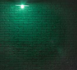 Poster - green chandelier lamp in a black brick room