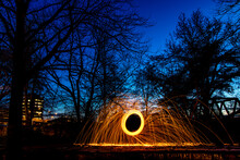 Vibrant Display Of Steel Wool Photography In A Park At Night