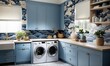 Wild Wallpaper featuring a blue, gray, and white Japanese landscape-inspired design adorns all four walls of this laundry room