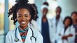 happy African American female doctor standing at the end of group