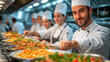 A group of chefs prepare a large number of dishes in a professional kitchen