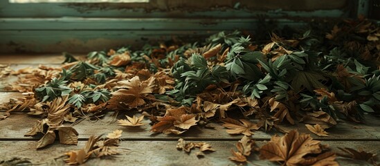 Sticker - A heap of dry and green foliage on the floor.