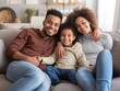 © Ace64 Studio - Happy family with child sitting on sofa, young parents embracing son relaxing on couch together