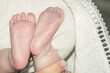 Children's little legs. Legs of a newborn baby. Baby's little fingers