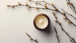 © Nate - Top view of a round open jar of moisturizer and a branch , isolated on a white background, copy space, minimalism