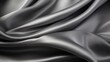 Close-up of luxurious silver satin fabric with soft, smooth folds and a silky texture.