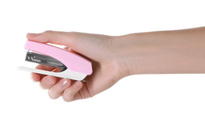 Wall Mural - Woman holding pink stapler on white background, closeup