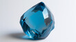 Sapphire Splendor: The Radiant Facets of a Cut and Polished Gemstone with Luxury Blue Topaz on a Pristine White Background