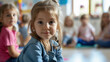 © SERHII - Portrait of a young girl with attentive eyes in a classroom.