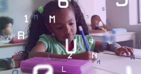 Poster - Image of letters and numbers over biracial schoolgirl concentrating writing at desk in class