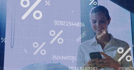 Poster - Percentage icons and changing numbers against caucasian businesswoman using smartphone at office