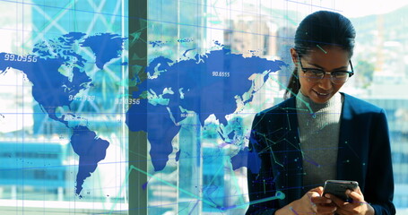 Poster - Network of connections over world map against businesswoman using smartphone at office