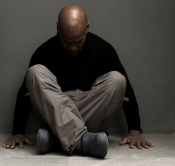 black man praying to god Caribbean man praying with people stock image stock photo