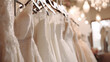 Wedding dress hanging in boutique shop