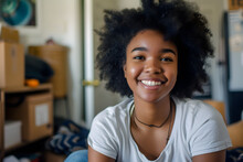 A Happy First-year Afro Student Smiles While Packing For College At Home And Unloading On Campus.