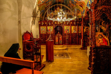 Wall Mural - Our Lady of Hamatoura orthodox monastery, Kannoubine Valley, Lebanon. Monk in church